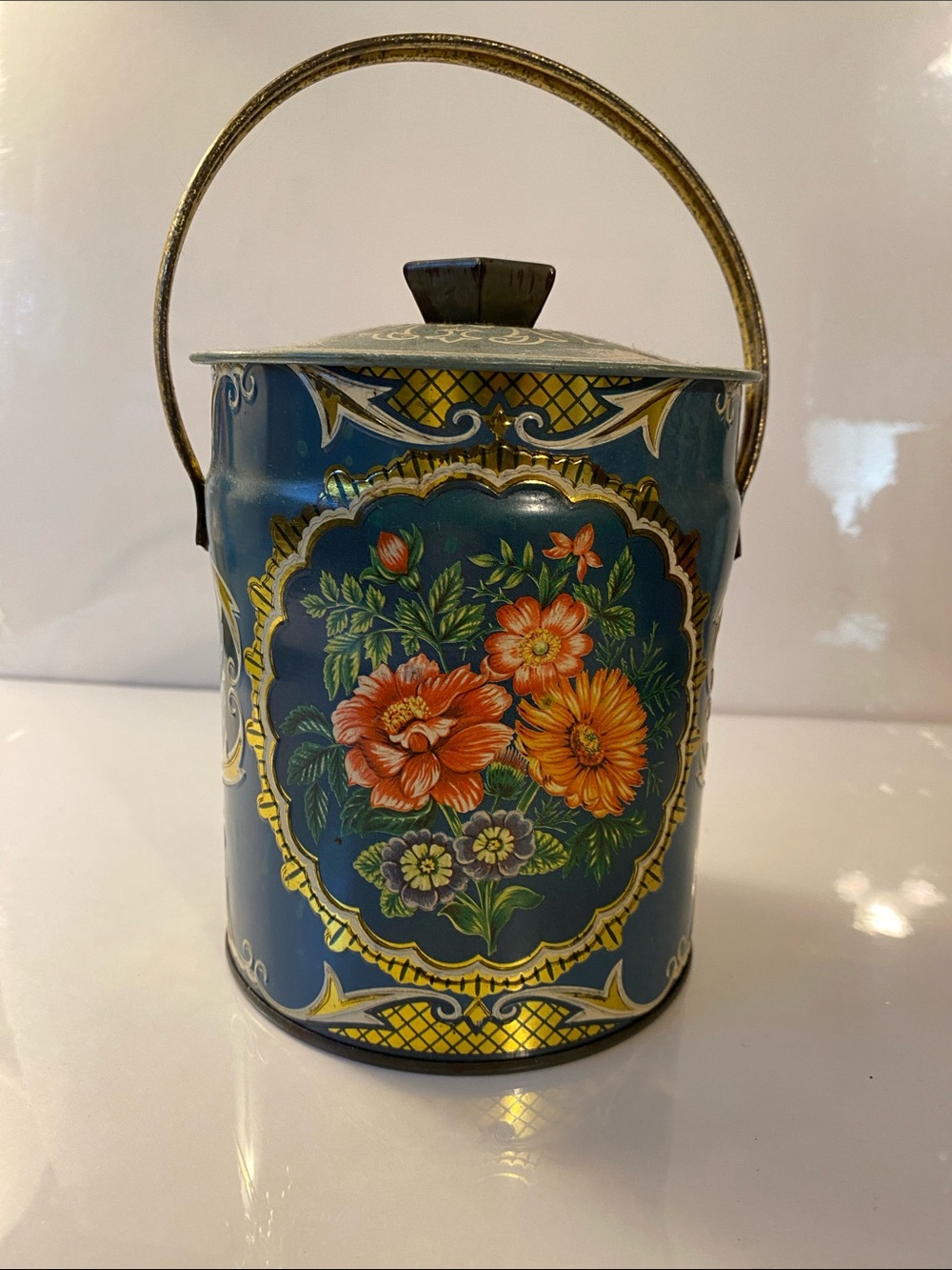 Hand-Painted Blue Floral Decorative Tin Canister with Gold Handle